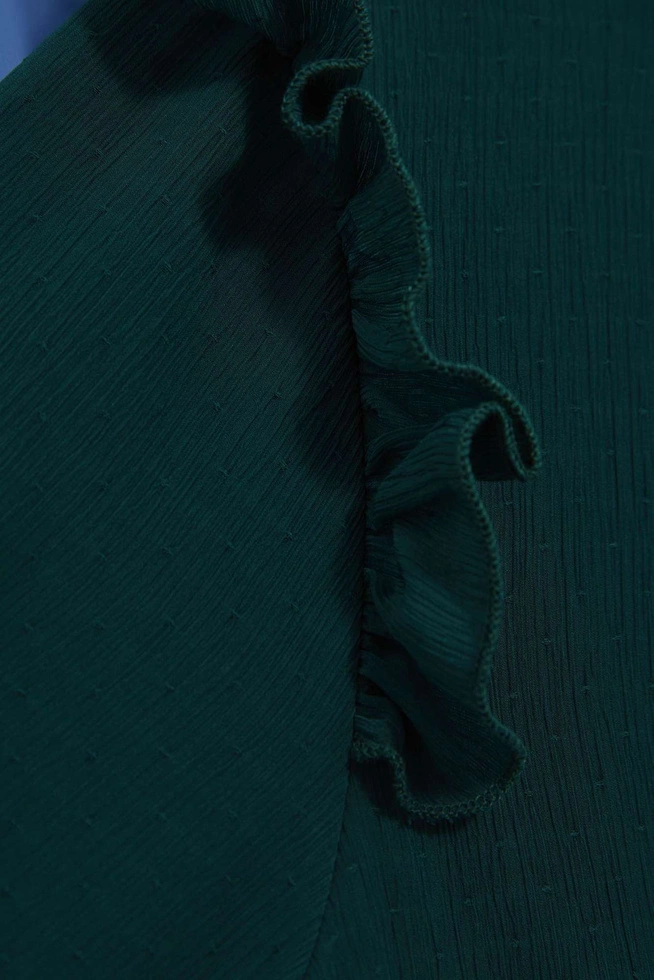 Koszula z falbaną na ramionach