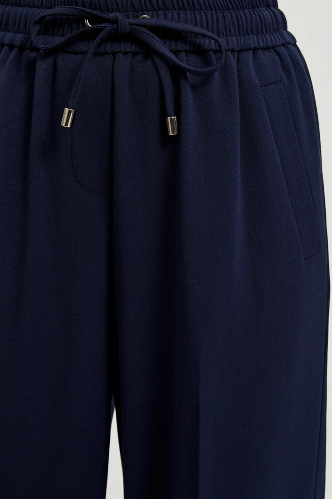 Spodnie z szerokimi nogawkami i wiązaniem w pasie granatowe