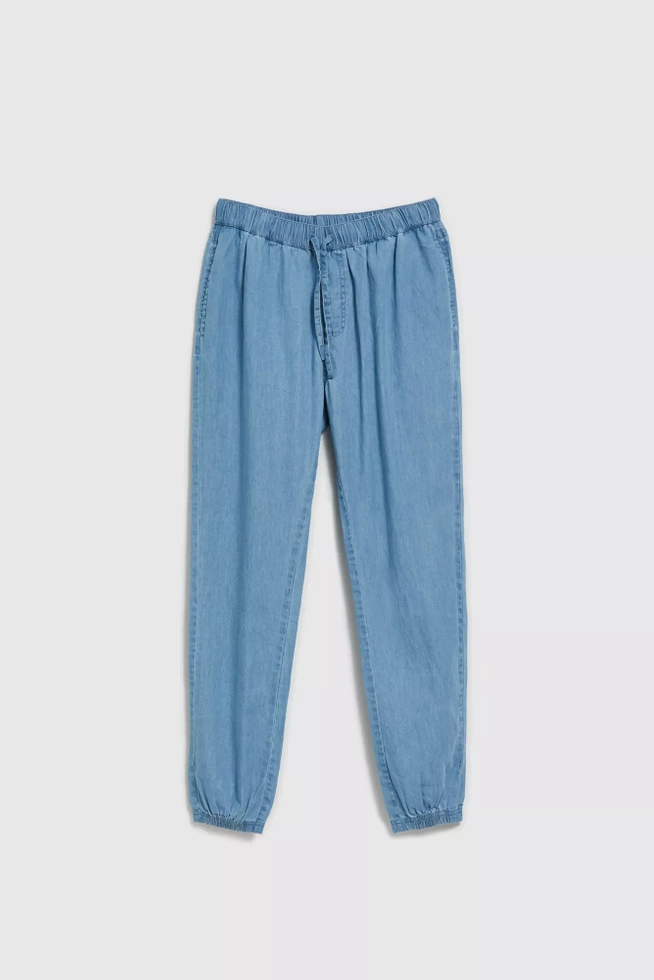 Jeansy z gumą w talii i nogawkach niebieskie