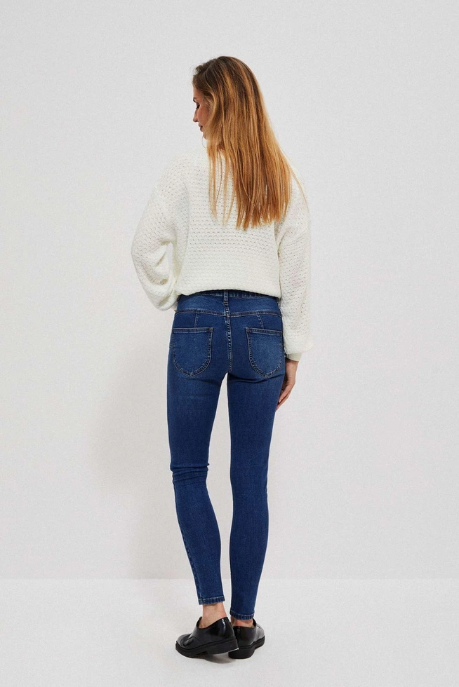 Jeansy skinny ze średnim stanem ciemnoniebieskie