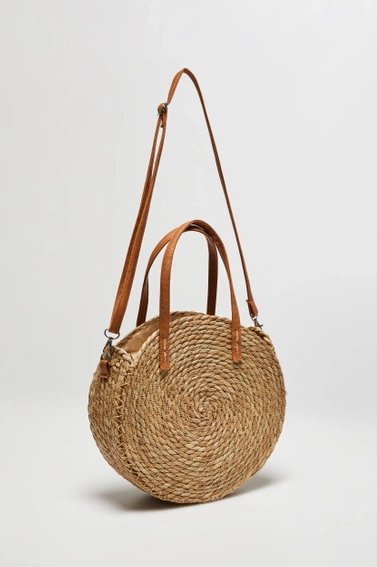 Pleciona torebka okrągła beżowa