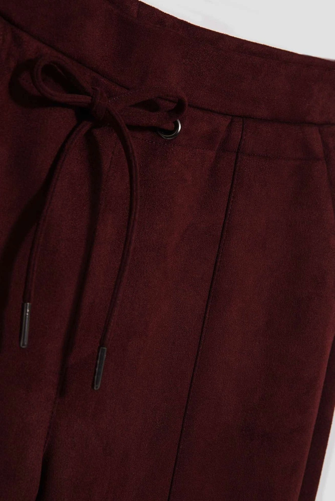 Spodnie kasztanowe z wiązaniem