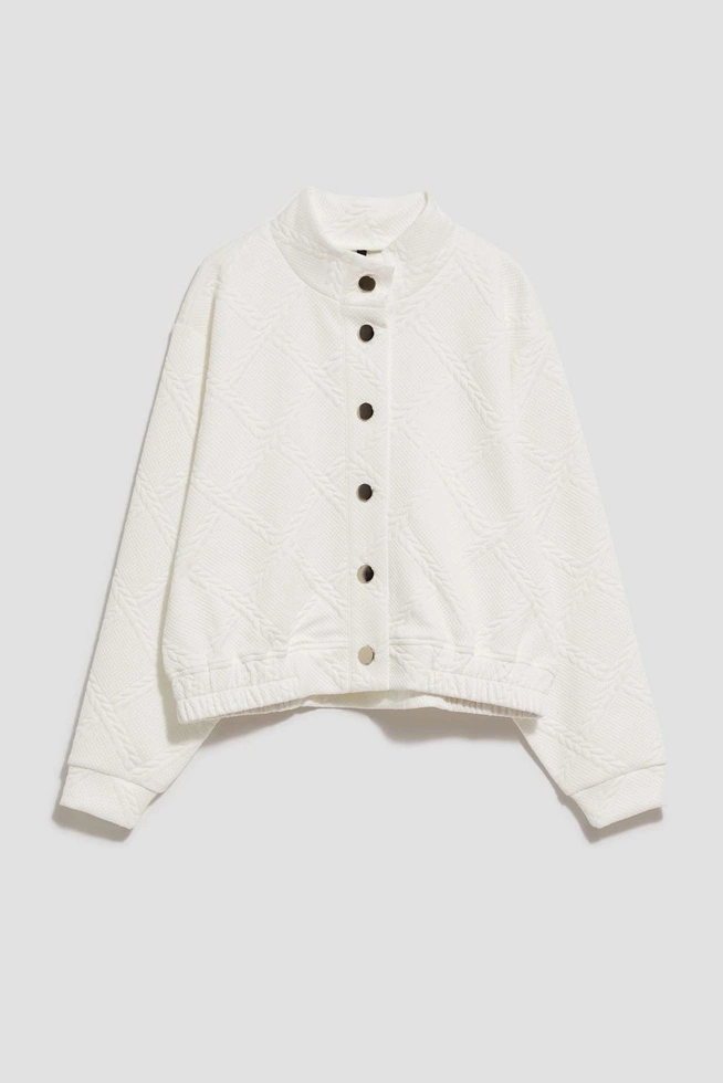 Bluza z ozdobnymi guzikami perłowa