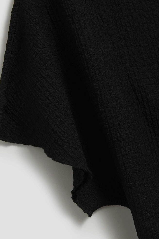 Elegancka bluzka z szerokimi rękawami czarna