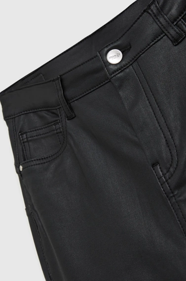 Woskowane spodnie rurki czarne