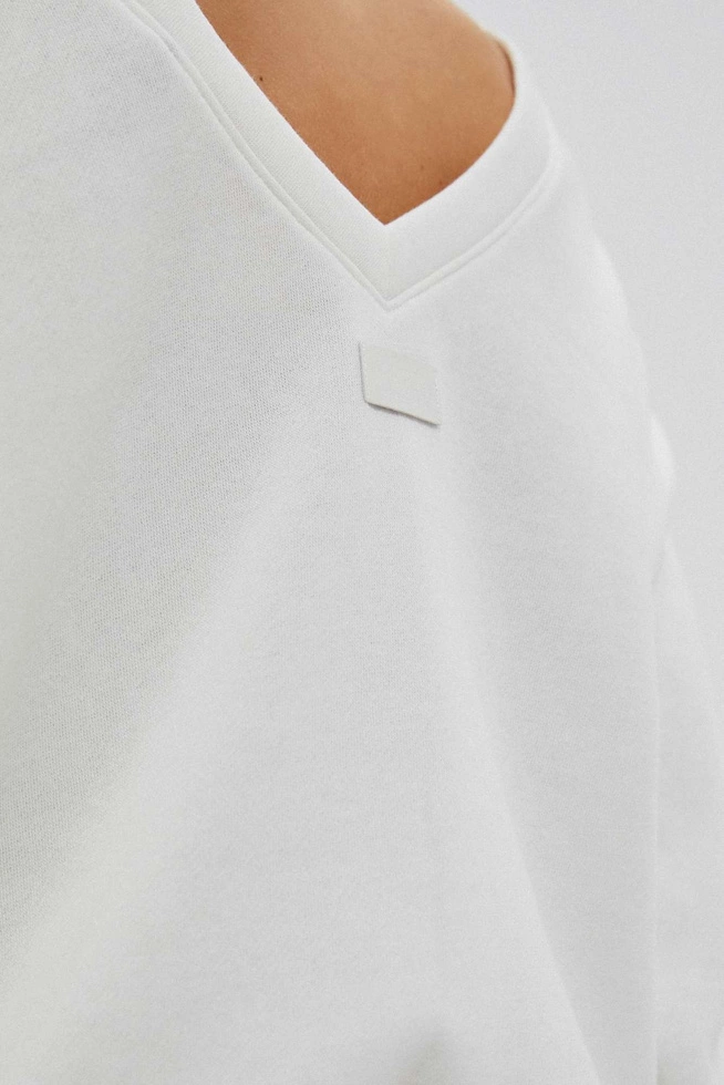 Bluza z dekoltem na plecach perłowa