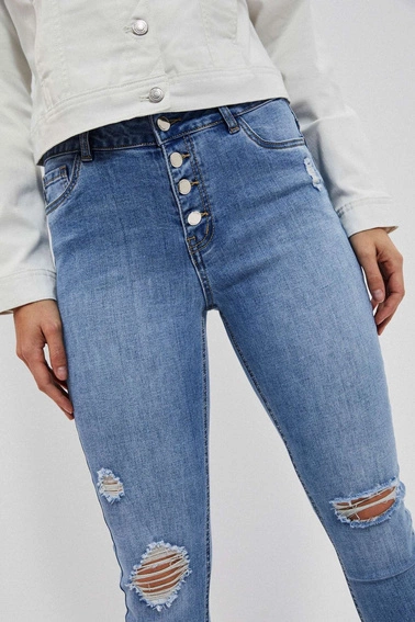 Jeansy rurki z przetarciami