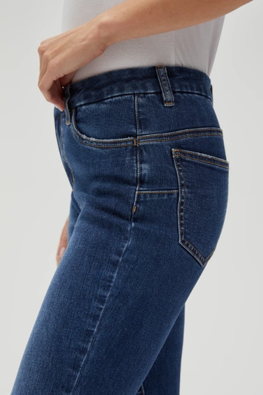 Jeansy skinny ze średnim stanem niebieskie