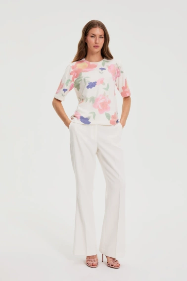 Spodnie z szerokimi nogawkami w kant białe