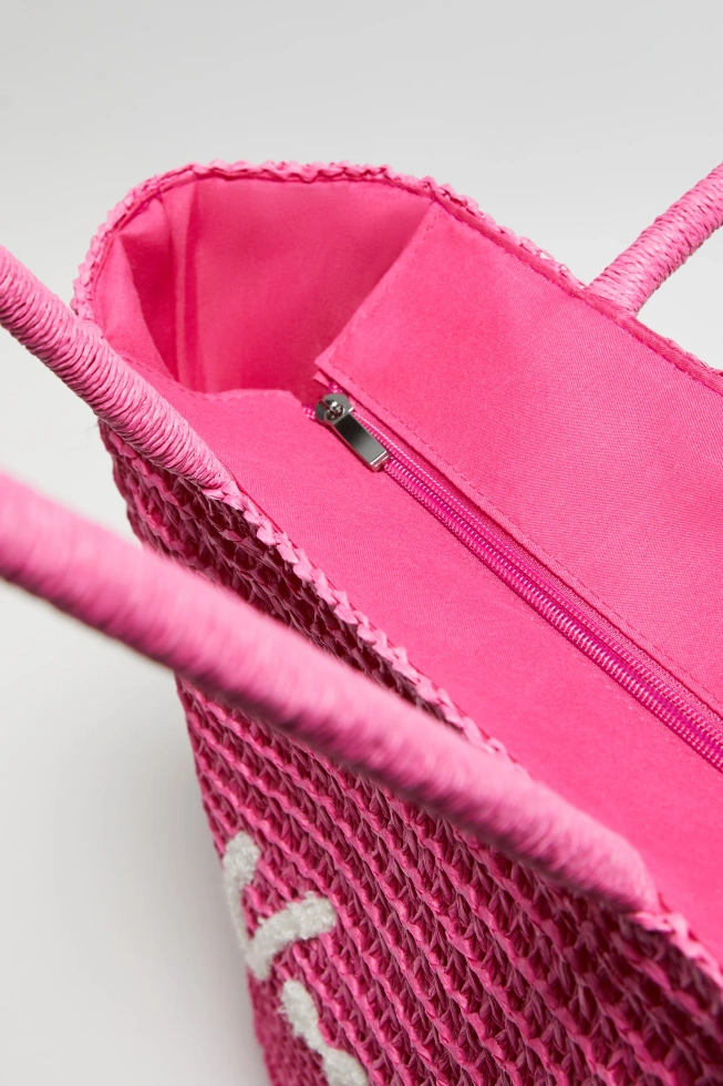 Pleciona torba z napisem różowa