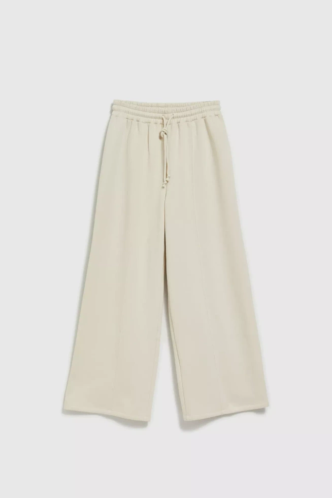 Spodnie dresowe z szerokimi nogawkami wiązane w talii beżowe