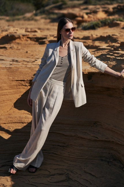 Lniane spodnie z szerokimi nogawkami beżowe