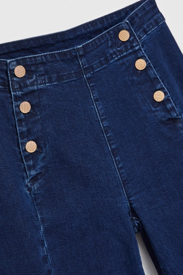Jeansy z ozdobnymi guzikami niebieskie