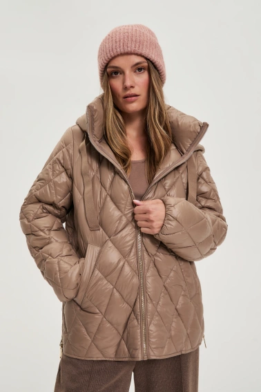Pikowana kurtka beżowa