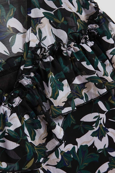 Koszula z falbanami i kwiecistym wzorem