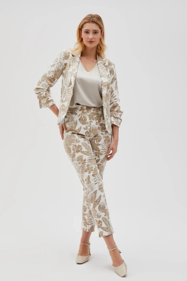 Spodnie z roślinnym wzorem beżowe