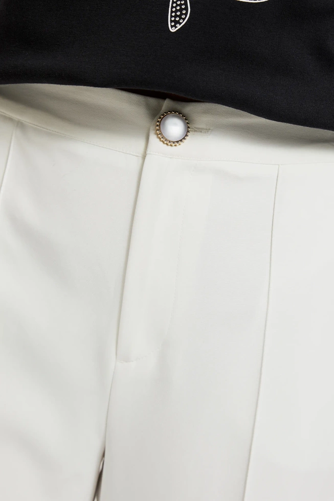 Eleganckie spodnie w kant białe