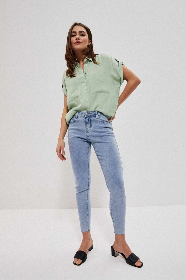 Jeansy medium waist z kieszeniami błękitne