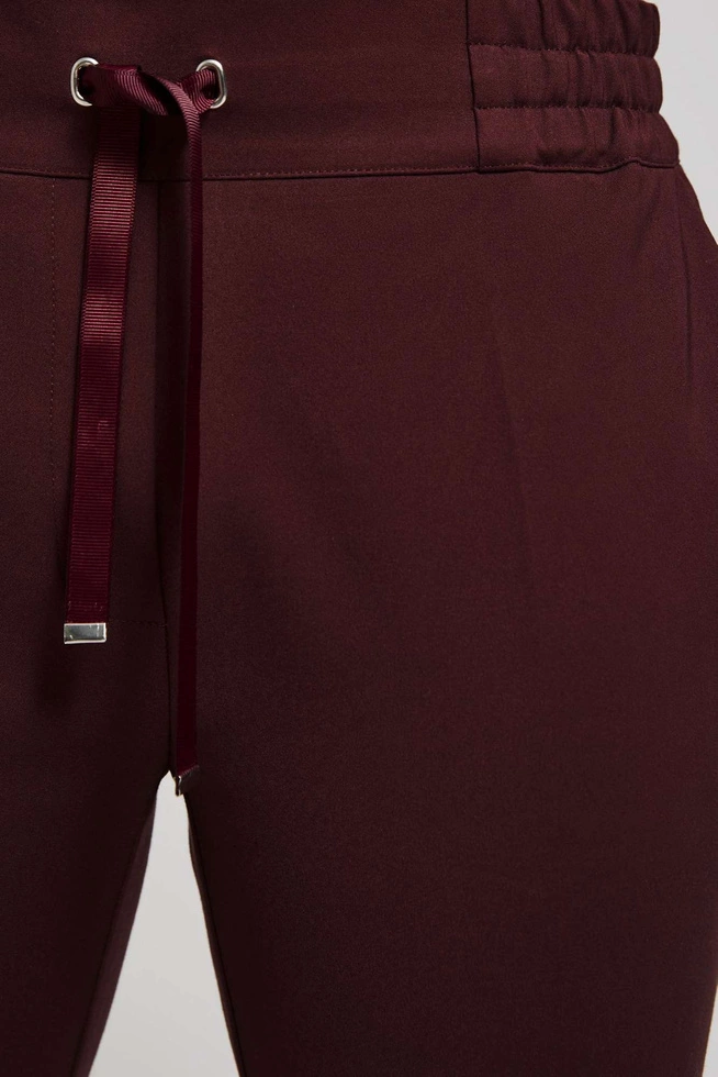 Gładkie spodnie z wiązaniem kasztanowe