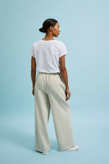 Spodnie dresowe z szerokimi nogawkami wiązane w talii beżowe