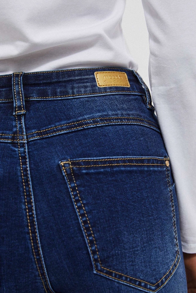 Jeansy push up z przetarciami na udach granatowe