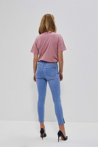 Jeansy medium waist z guzikami na nogawkach niebieskie