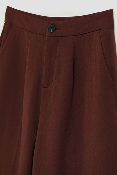 Spodnie w kant brązowe