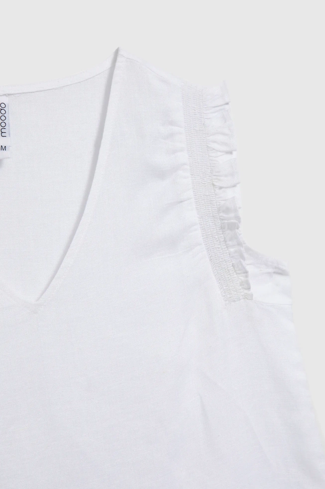 Koszula z falbaną na ramionach biała