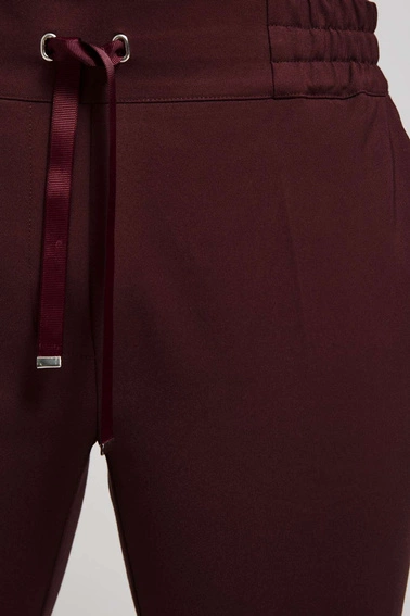 Gładkie spodnie z wiązaniem kasztanowe