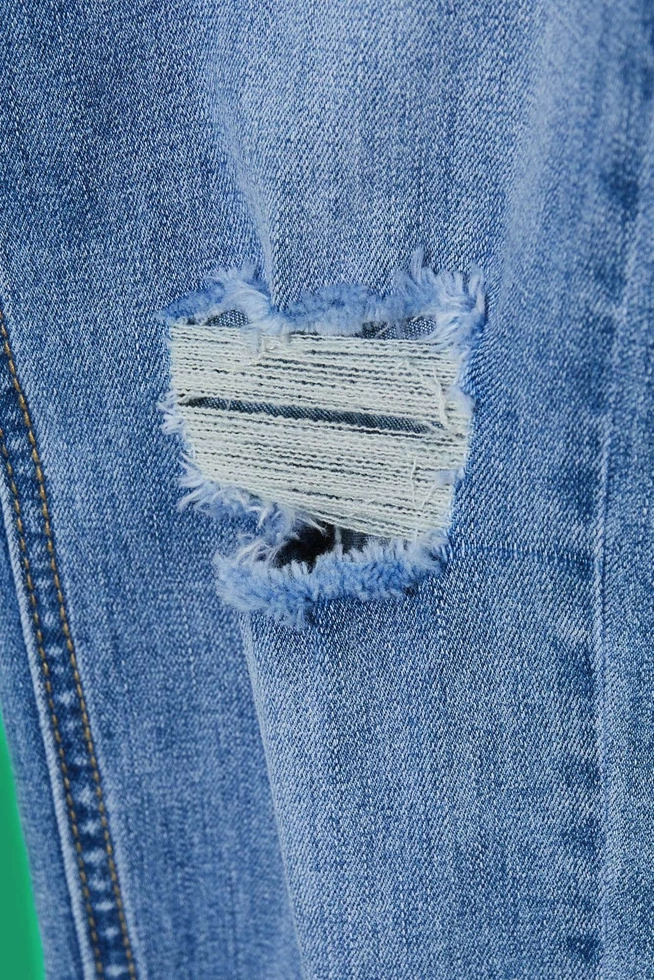 Jeansy rurki z przetarciami