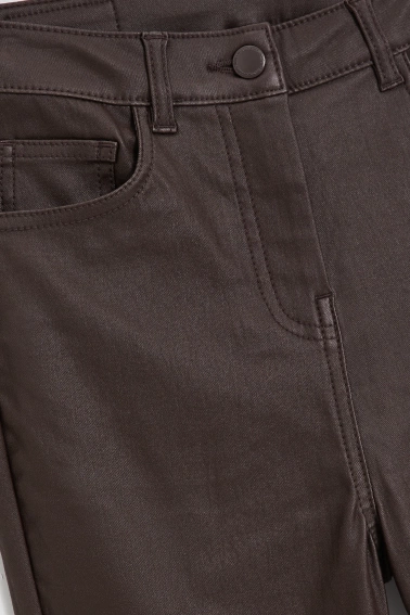 Woskowane spodnie brązowe