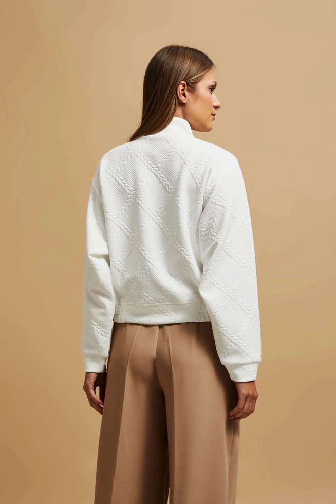 Bluza z ozdobnymi guzikami perłowa