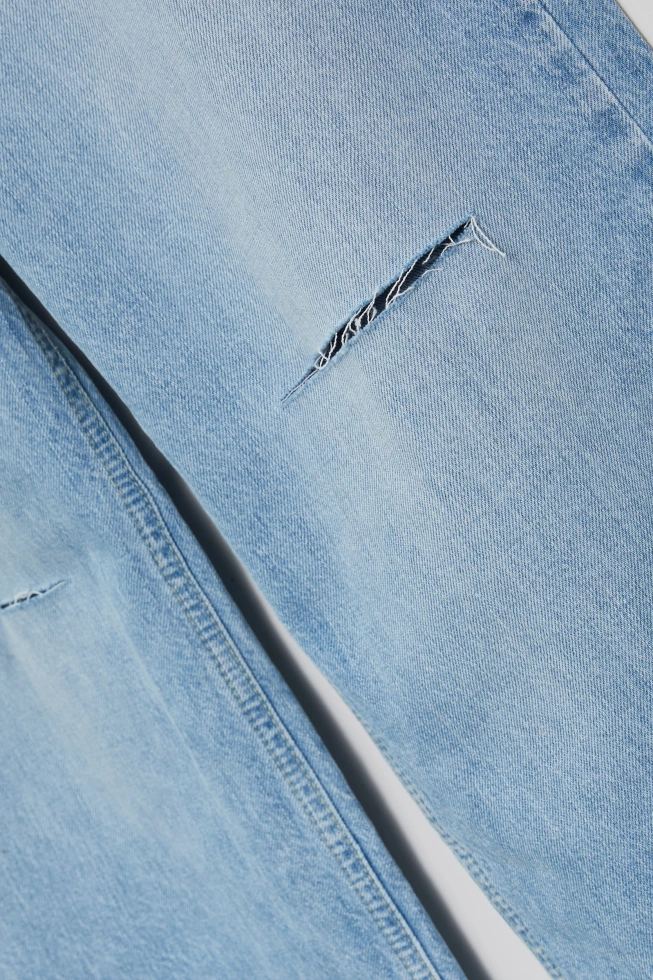 Jeansy wide leg z rozcięciami błękitne