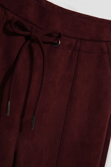 Spodnie kasztanowe z wiązaniem