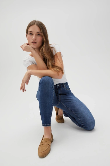 Jeansy skinny ze średnim stanem niebieskie