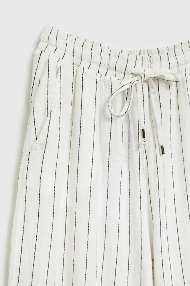 Lniane spodnie w paski białe