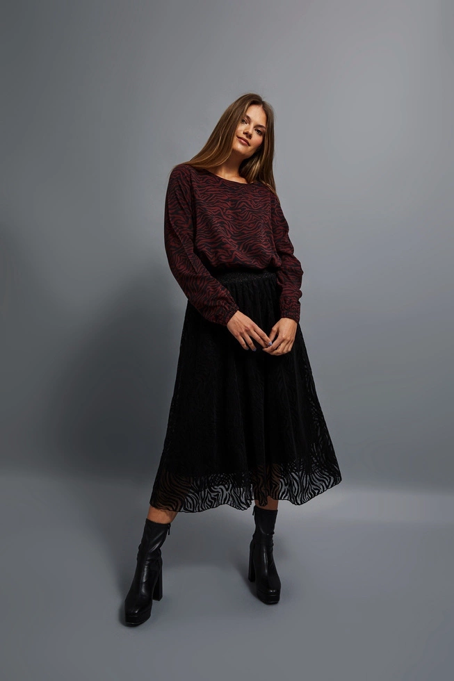 Rozkloszowana spódnica midi