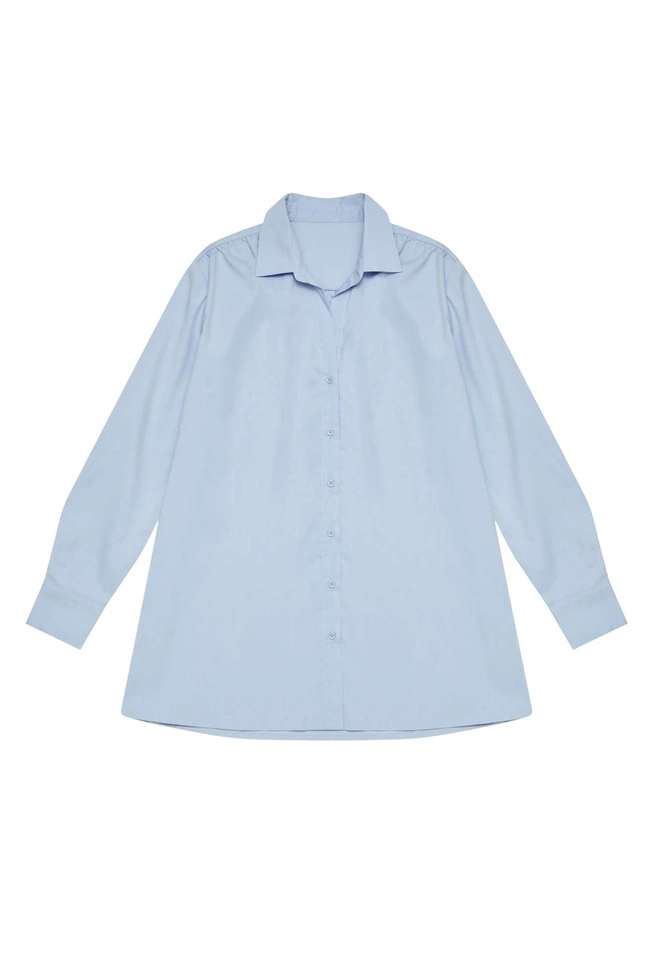 Koszula z rozkloszowanym dołem błękitna