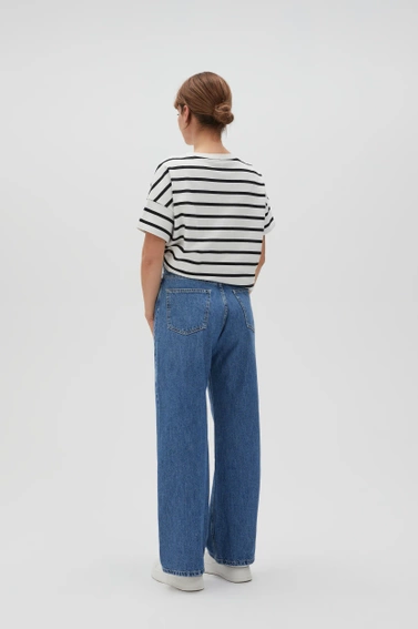 Gładkie jeasny z szerokimi nogawkami niebieskie