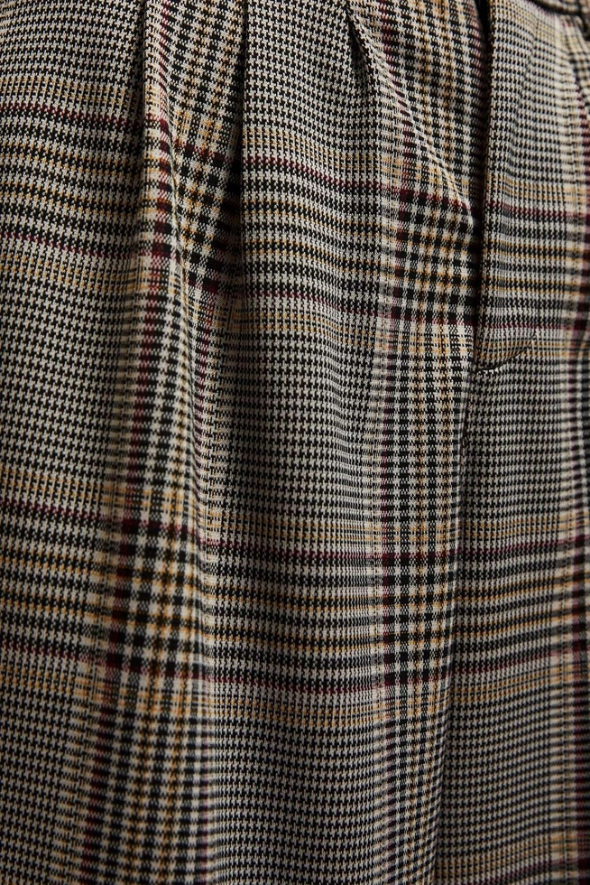 Spodnie w kratę z szerokimi nogawkami