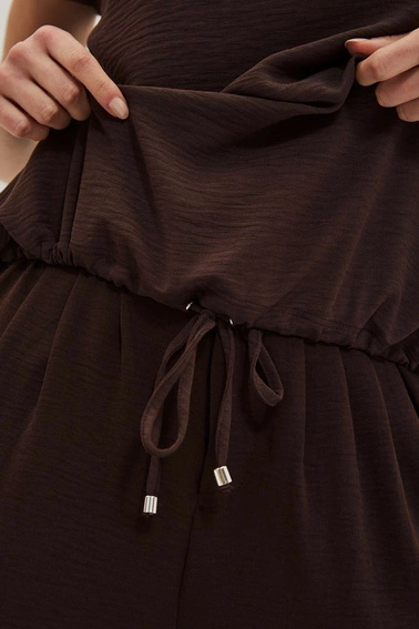 Koszulowa bluzka z wiązaniem w pasie