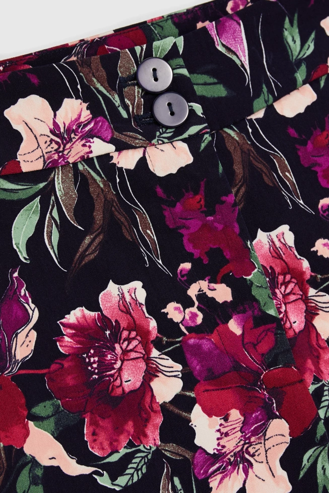 Spodnie w kwiaty granatowe