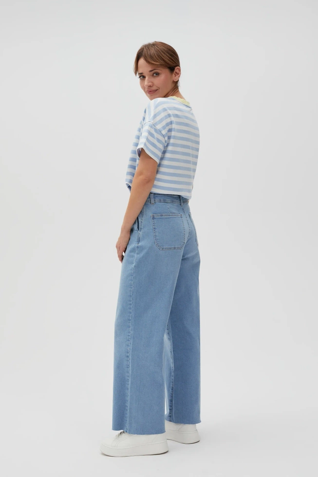 Gładkie jeansy z szerokimi nogawkami niebieskie