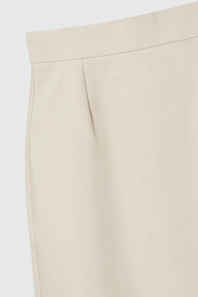 Ołówkowa spódnica beżowa