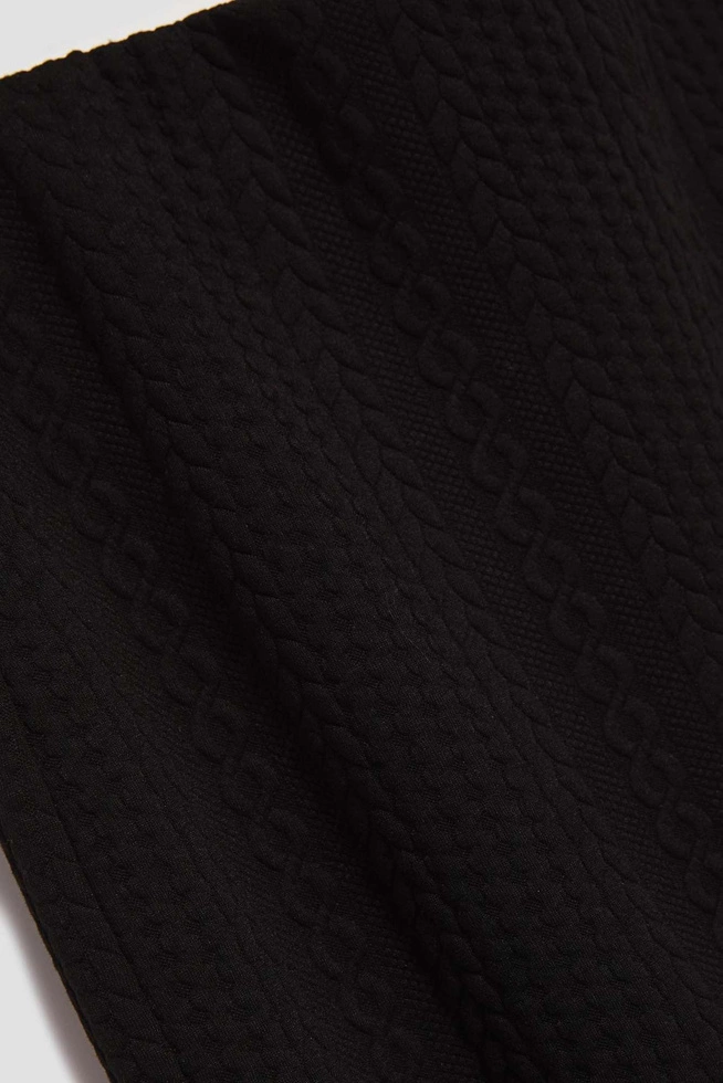 Ołówkowa spódnica w swetrowy wzór czarna