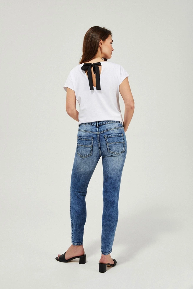 Jeansy rurki medium waist z przetarciami niebieskie