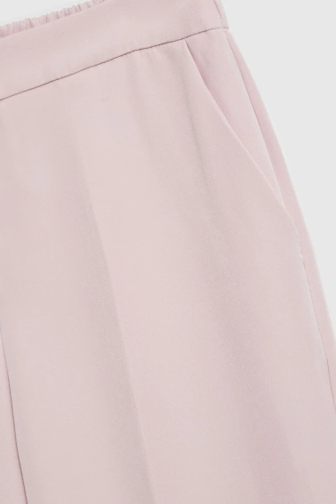 Spodnie z kantem różowe