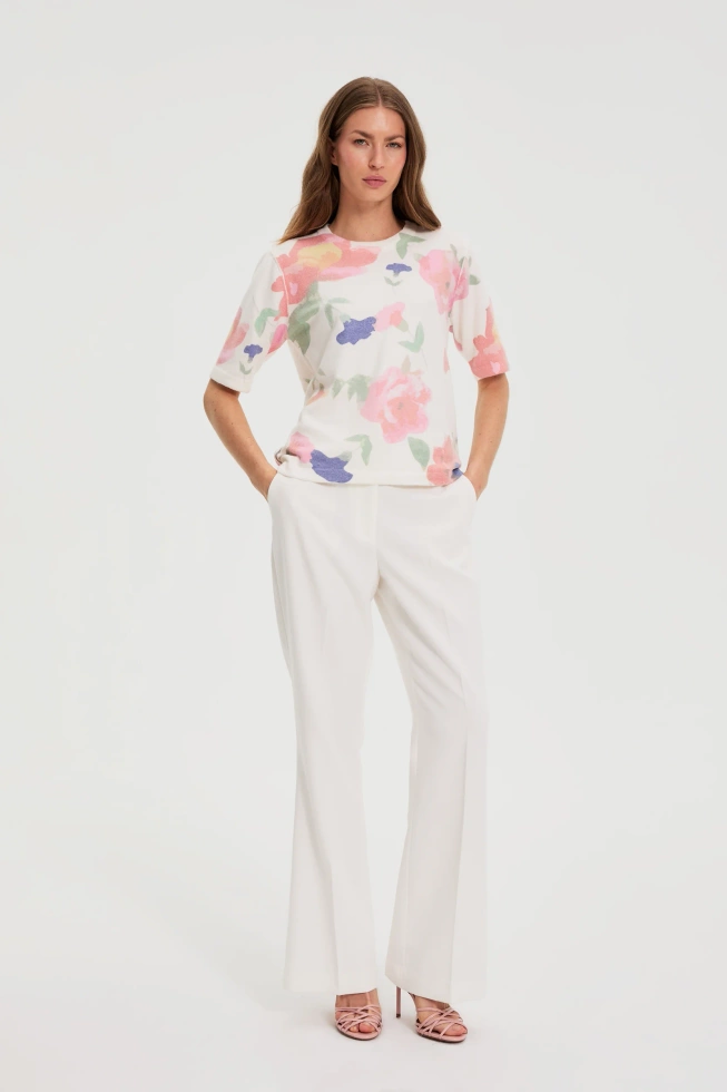 Spodnie z szerokimi nogawkami w kant białe