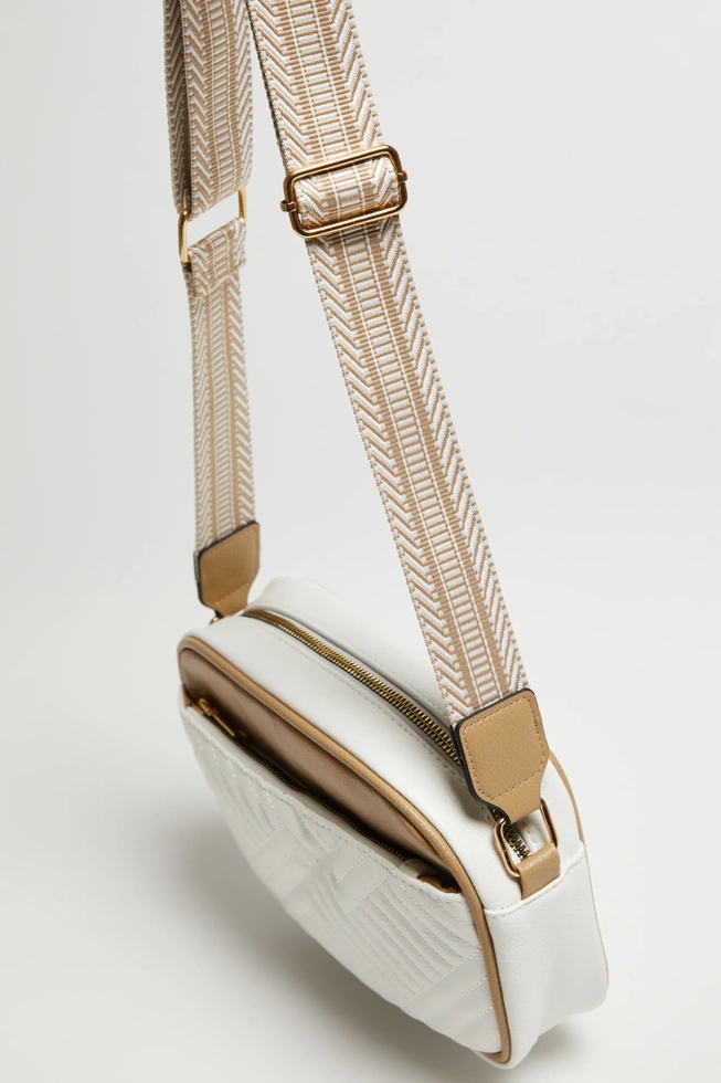 Pikowana torebka beżowa