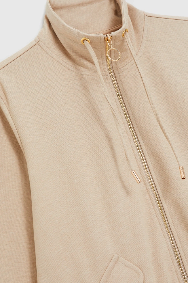 Bluza zapinana na zamek beżowa